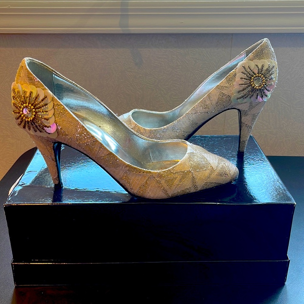 White satin silver wedding shoe